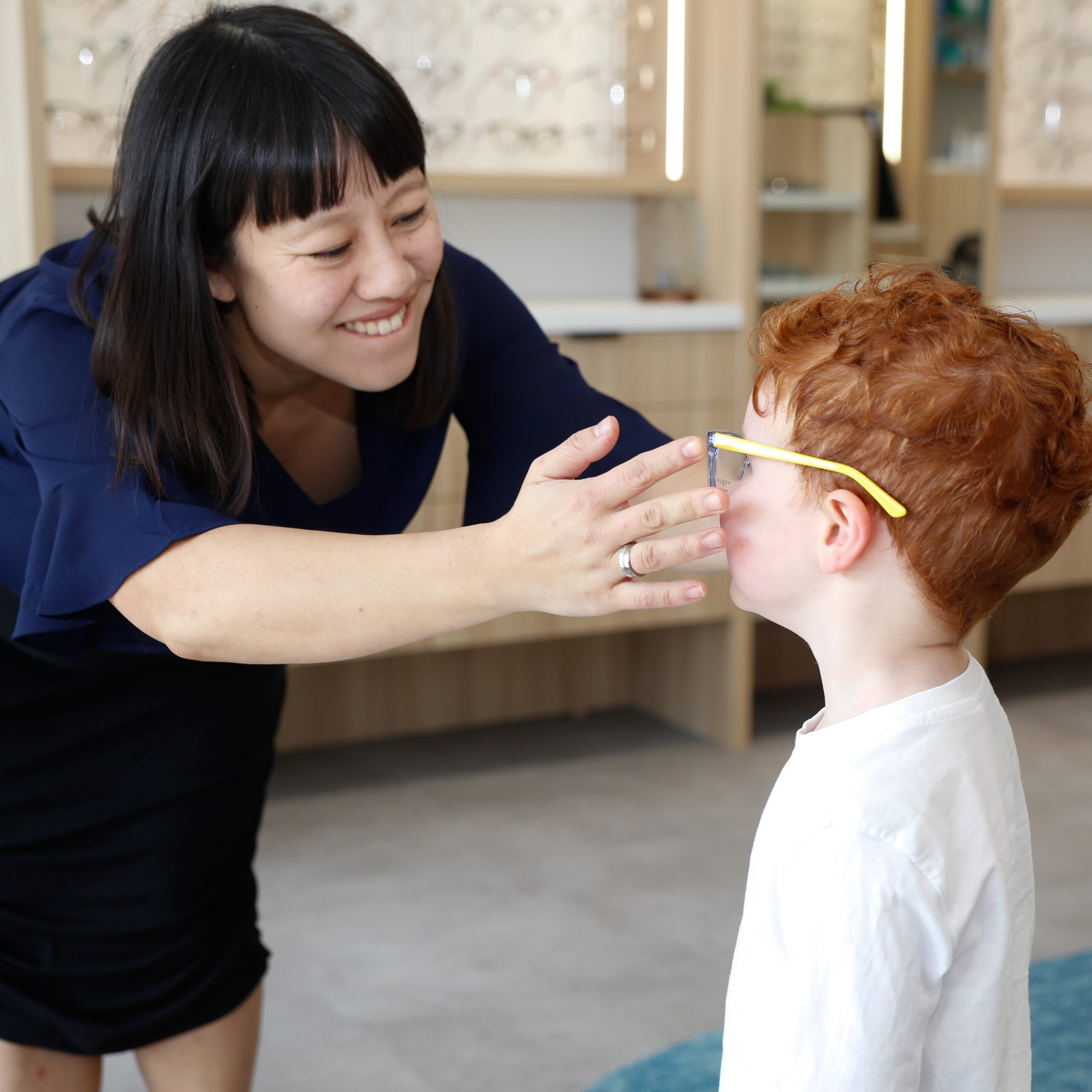 Child having a behavioral optometry examination
